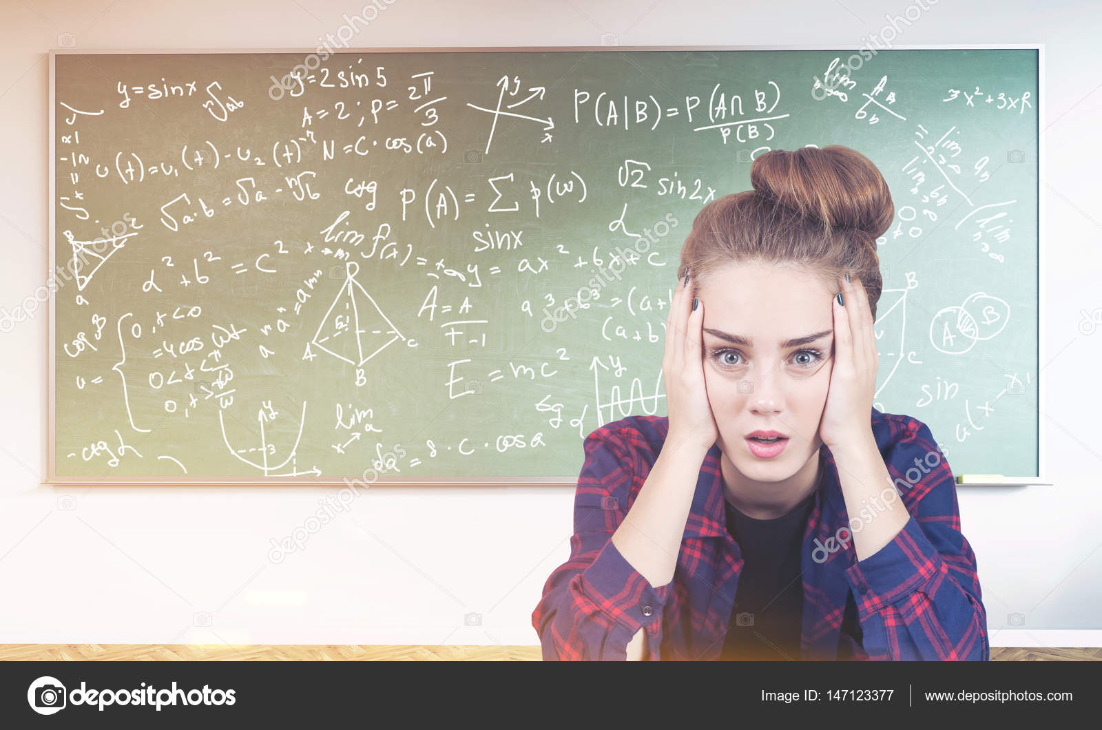 Stressed teen girl, formulas on blackboard, toned Stock Photo by ...