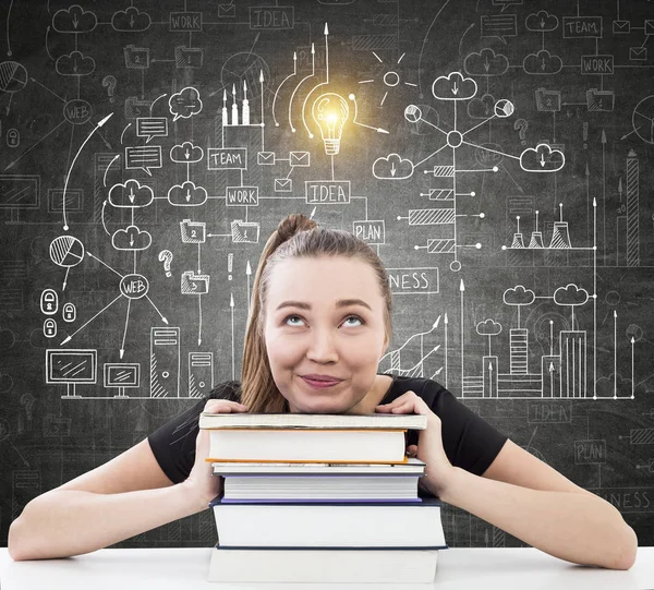Girl with books and business scheme — Stock Photo, Image