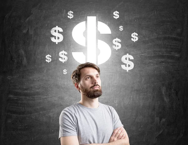 Man in T-shirt en dollartekens — Stockfoto