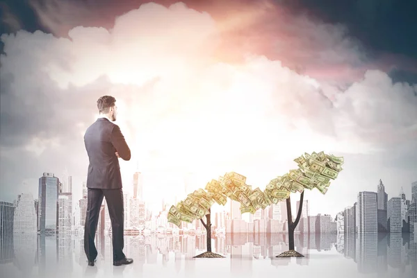 Hombre en traje y gráfico de planta — Foto de Stock