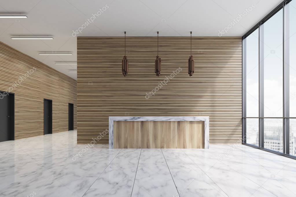 Wooden reception and marble floor
