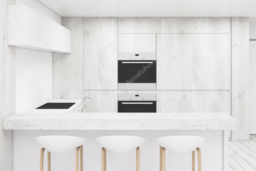 White kitchen with counters, close up