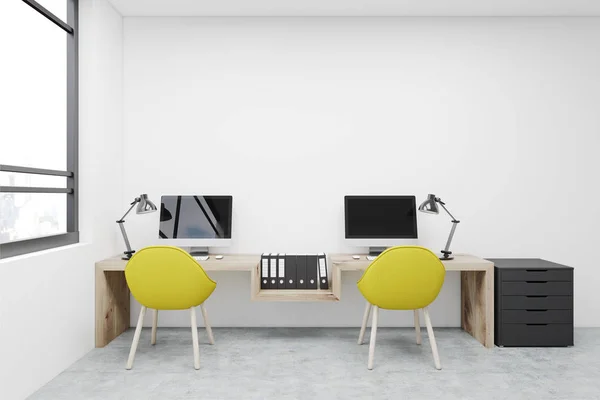 Workplace, two yellow chairs, computers