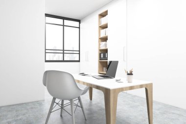 Bir işyeri, beyaz sandalye köşesinde