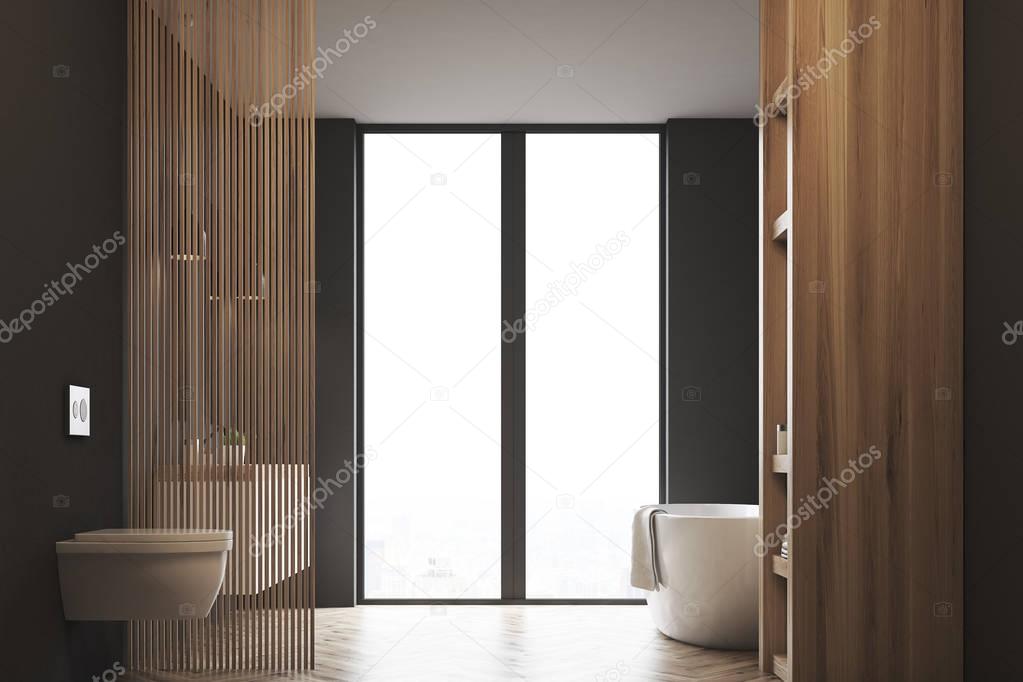 Bathtub with toilet, dark wood