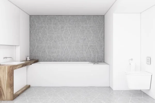 Banheiro com uma parede cinza e banheiro — Fotografia de Stock