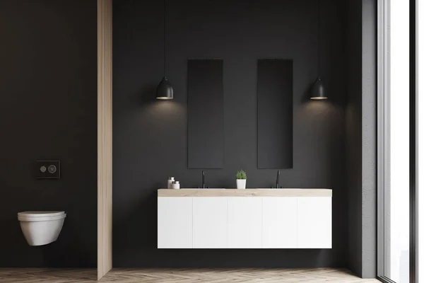 Toilettes et lavabo, mur noir — Photo