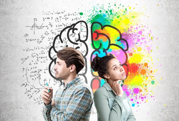 Man and woman with large brain sketch — Stock Photo, Image