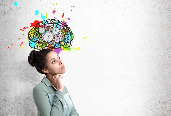 African woman and brain with gears — Stock Photo, Image