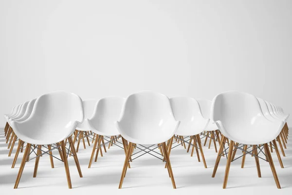 Ряды белых стульев, спереди — стоковое фото