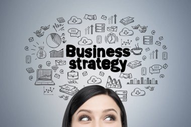 Woman s head and business strategy clipart