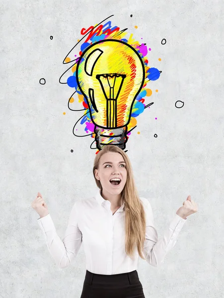 Happy blond woman and light bulb — Stock Photo, Image