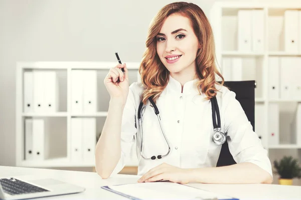Woman doctor in her office — Stock Photo, Image