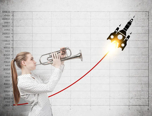 Woman with trumpet and rocket sketch — Stock Photo, Image
