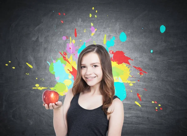 Chica con salpicaduras de manzana y color — Foto de Stock