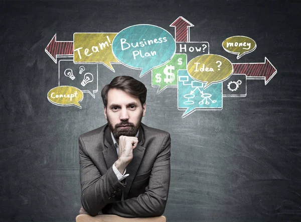 Grave business man e business schema — Foto Stock