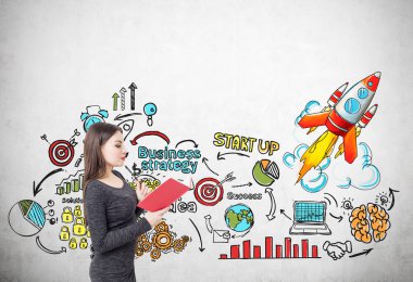 Kadın kitap ve roket başlatma