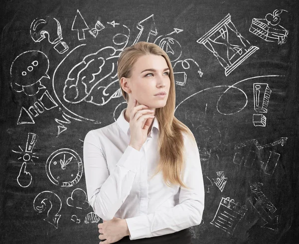 Thinking blond woman and her business growth — Stock Photo, Image