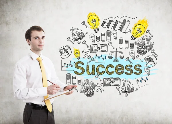 Man with clipboard and success sketch — Stock Photo, Image