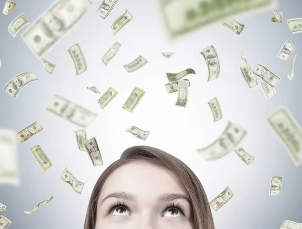 Blond teen s head and dollar rain — Stock Photo, Image