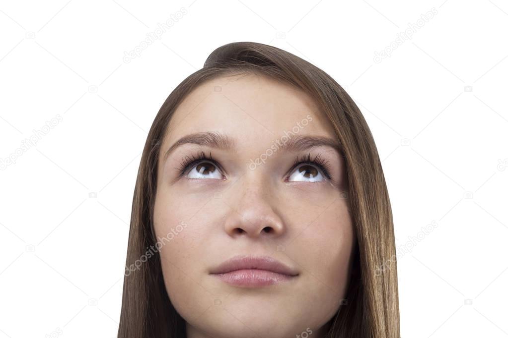 Young girl s face looking up isolated