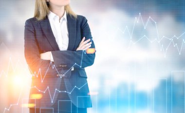 Kendine güvenen sarışın broker bir şehirde, grafikler