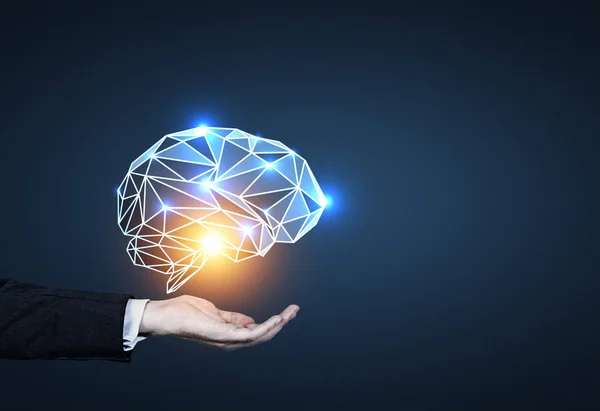 Man s hand holding brain hologram, blue — Stock Photo, Image