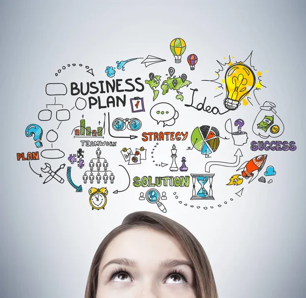 Biondo teen s testa e business plan — Foto Stock