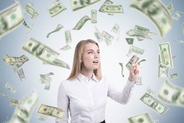 İşaret parmağı, Doları yağmur ile sarışın iş kadını