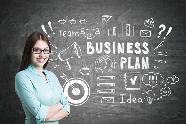 Young woman in blueish shirt, planning — Stock Photo, Image