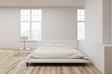 Beyaz yatak ahşap zemin