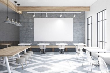 Cafe masa, yuvarlak sandalye, büyük poster ile