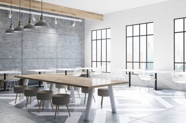 Masalar, sandalyeler, beton yuvarlak ile Cafe