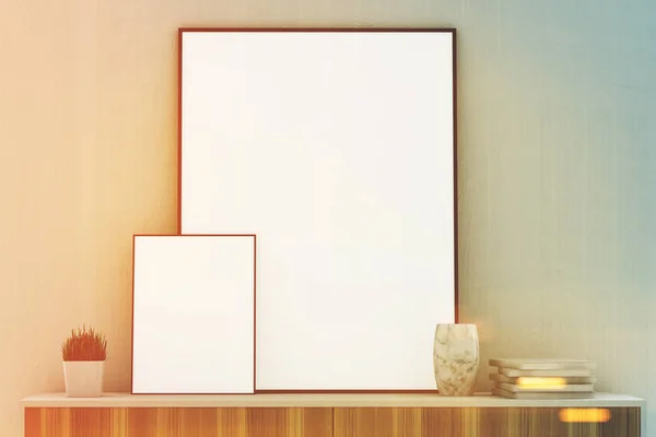 Dois cartazes verticais em um armário, branco tonificado — Fotografia de Stock
