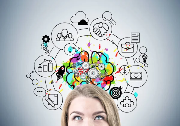 Blond businesswoman s head, brain with gears — Stock Photo, Image