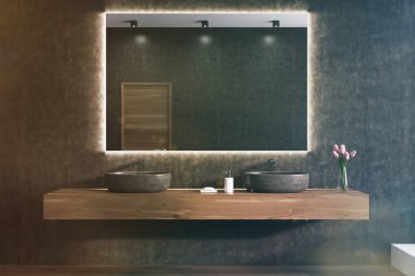 Lavabo tonda bir siyah banyo duvarda ayna