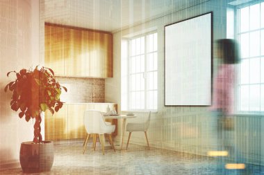 Bir poster, ahşap mutfak tezgahı, kız beyaz mutfak