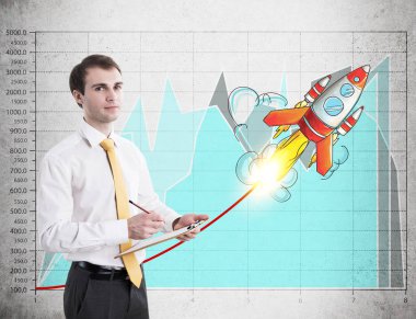 İşadamı ile bir pano, başlangıç roket