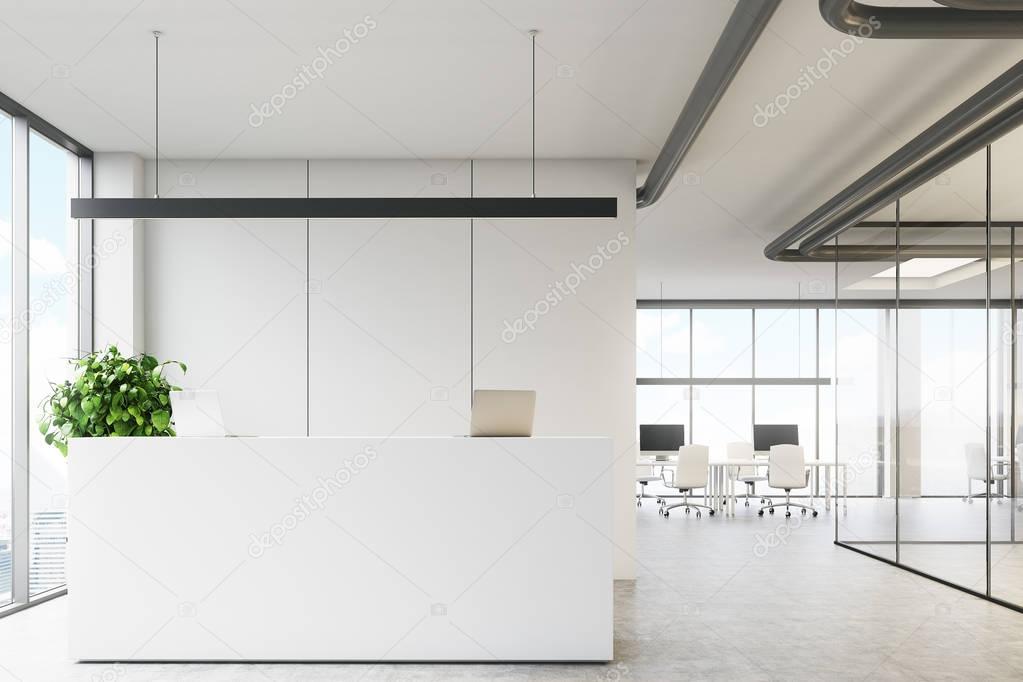 White office with a reception desk