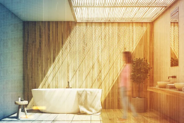 Wooden bathroom interior with tub and tree toned — Stock Photo, Image