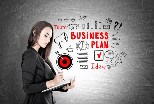 Businesswoman with a planner, business plan
