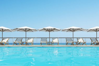 Beyaz şezlong, şemsiye