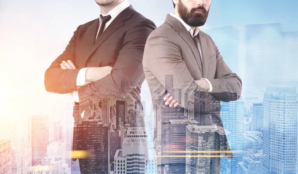 Two confident businessmen in a morning city — Stock Photo, Image