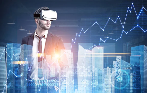 Businessman in VR glasses, HUD, graphs, city — Stock Photo, Image