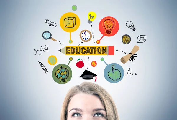 Blonde woman s head and an education sketch — Stock Photo, Image