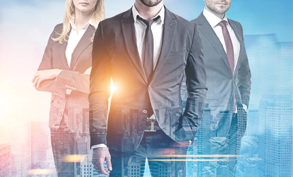 Business team in a blue city — Stock Photo, Image