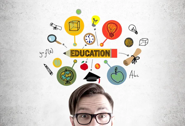 Amazed hipster in glasses and an education sketch — Stock Photo, Image
