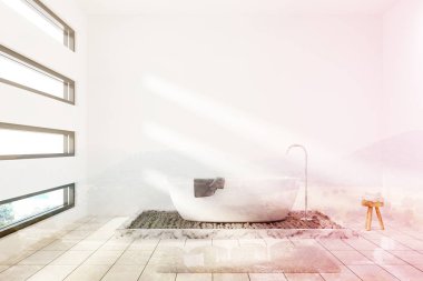 Tonda bir küvet ile beyaz banyo