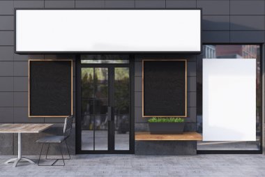 Gri kafe dış dört poster ile