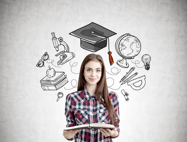 Lachende tiener met een boek, onderwijs pictogrammen — Stockfoto